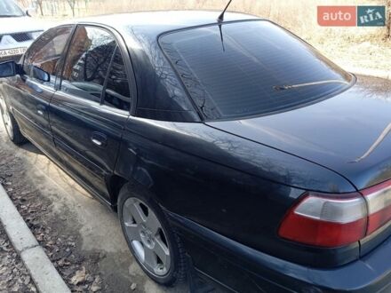 Черный Опель Омега, объемом двигателя 2.5 л и пробегом 300 тыс. км за 3400 $, фото 1 на Automoto.ua