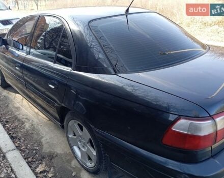 Черный Опель Омега, объемом двигателя 2.5 л и пробегом 300 тыс. км за 3400 $, фото 1 на Automoto.ua