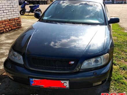 Чорний Опель Омега, об'ємом двигуна 2.5 л та пробігом 300 тис. км за 3400 $, фото 1 на Automoto.ua