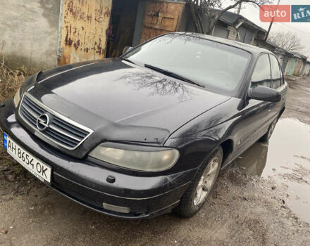 Черный Опель Омега, объемом двигателя 2.2 л и пробегом 313 тыс. км за 3200 $, фото 1 на Automoto.ua