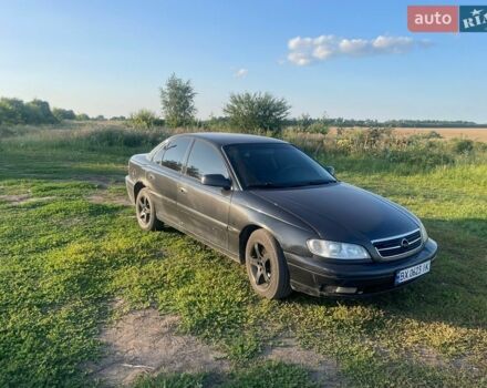 Черный Опель Омега, объемом двигателя 2.2 л и пробегом 336 тыс. км за 1700 $, фото 1 на Automoto.ua