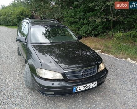 Черный Опель Омега, объемом двигателя 2.2 л и пробегом 202 тыс. км за 1950 $, фото 1 на Automoto.ua