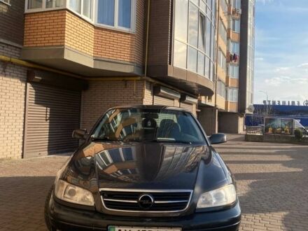 Черный Опель Омега, объемом двигателя 2.2 л и пробегом 320 тыс. км за 2100 $, фото 1 на Automoto.ua