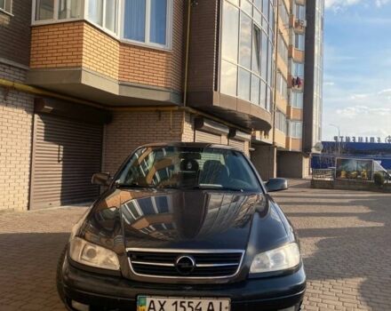Чорний Опель Омега, об'ємом двигуна 2.2 л та пробігом 320 тис. км за 2100 $, фото 1 на Automoto.ua
