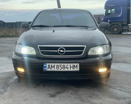 Черный Опель Омега, объемом двигателя 2.2 л и пробегом 374 тыс. км за 3100 $, фото 1 на Automoto.ua