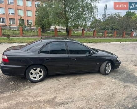 Черный Опель Омега, объемом двигателя 2.5 л и пробегом 390 тыс. км за 3250 $, фото 1 на Automoto.ua