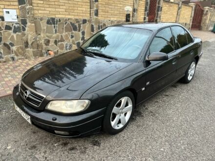 Черный Опель Омега, объемом двигателя 2.2 л и пробегом 300 тыс. км за 2700 $, фото 1 на Automoto.ua