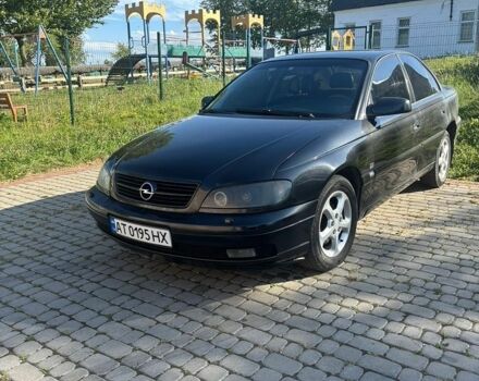 Черный Опель Омега, объемом двигателя 2.2 л и пробегом 400 тыс. км за 3500 $, фото 1 на Automoto.ua