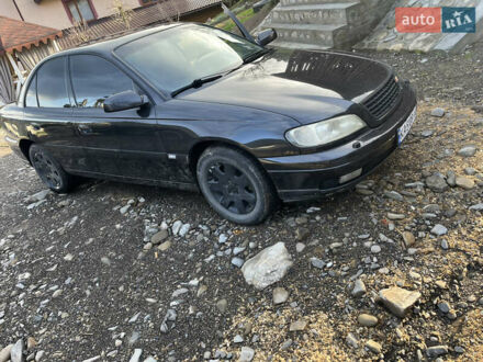Опель Омега 2001 у Верховине на Automoto.ua Чорний Опель Омега, об'ємом двигуна 2.2 л та пробігом 260 тис. км за 2450 $, фото 1 на Automoto.ua