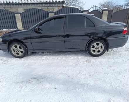 Черный Опель Омега, объемом двигателя 2 л и пробегом 300 тыс. км за 3600 $, фото 1 на Automoto.ua