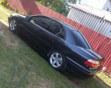 Черный Опель Омега, объемом двигателя 2.6 л и пробегом 434 тыс. км за 3500 $, фото 1 на Automoto.ua