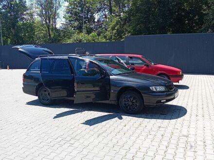 Чорний Опель Омега, об'ємом двигуна 2.2 л та пробігом 320 тис. км за 2400 $, фото 1 на Automoto.ua