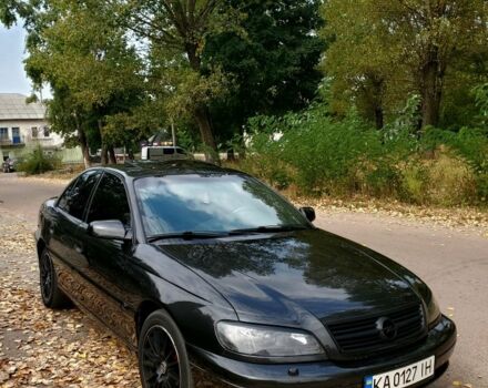Чорний Опель Омега, об'ємом двигуна 2.2 л та пробігом 350 тис. км за 3100 $, фото 1 на Automoto.ua