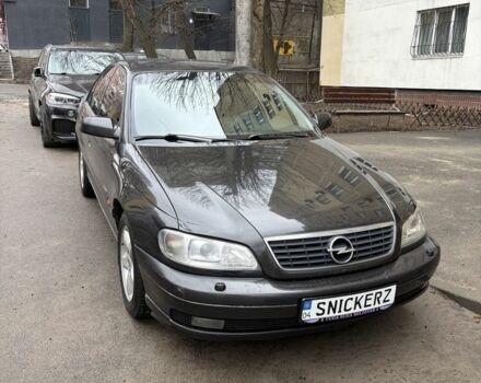 Черный Опель Омега, объемом двигателя 2.6 л и пробегом 409 тыс. км за 3700 $, фото 1 на Automoto.ua