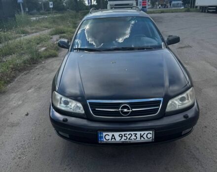 Черный Опель Омега, объемом двигателя 2.2 л и пробегом 370 тыс. км за 2500 $, фото 1 на Automoto.ua