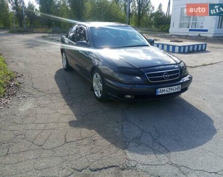 Черный Опель Омега, объемом двигателя 2.96 л и пробегом 300 тыс. км за 2999 $, фото 1 на Automoto.ua