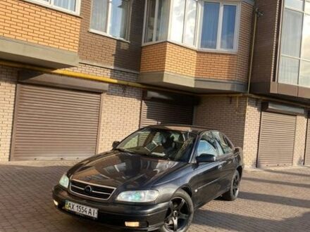 Черный Опель Омега, объемом двигателя 2.2 л и пробегом 320 тыс. км за 2100 $, фото 1 на Automoto.ua