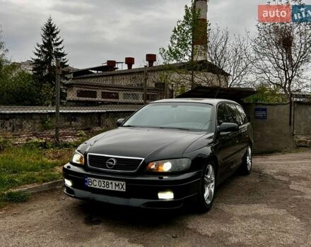 Черный Опель Омега, объемом двигателя 2.5 л и пробегом 385 тыс. км за 4500 $, фото 1 на Automoto.ua