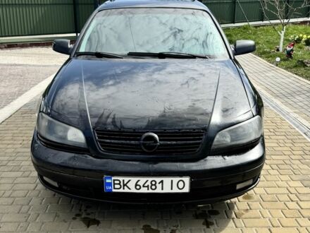 Черный Опель Омега, объемом двигателя 2.5 л и пробегом 374 тыс. км за 2100 $, фото 1 на Automoto.ua