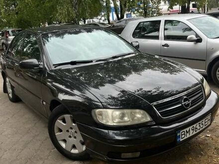 Опель Омега 2002 у Сумах на Automoto.ua Чорний Опель Омега, об'ємом двигуна 2.17 л та пробігом 330 тис. км за 3300 $, фото 1 на Automoto.ua