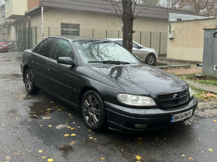 Черный Опель Омега, объемом двигателя 2.2 л и пробегом 320 тыс. км за 2999 $, фото 1 на Automoto.ua