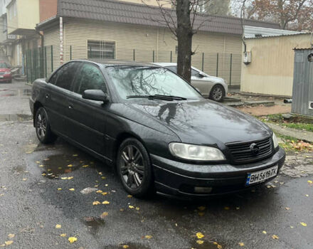 Черный Опель Омега, объемом двигателя 2.2 л и пробегом 320 тыс. км за 2999 $, фото 1 на Automoto.ua