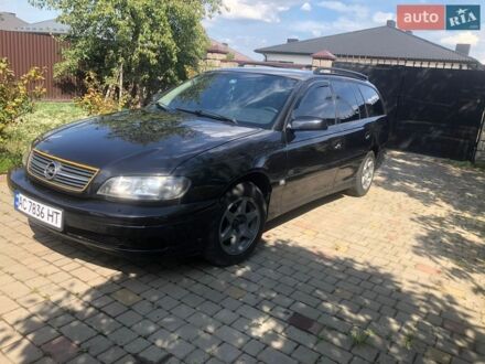 Черный Опель Омега, объемом двигателя 2.2 л и пробегом 395 тыс. км за 3400 $, фото 1 на Automoto.ua