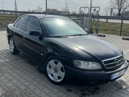 Черный Опель Омега, объемом двигателя 2.6 л и пробегом 300 тыс. км за 2500 $, фото 1 на Automoto.ua