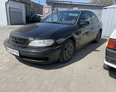Черный Опель Омега, объемом двигателя 2.2 л и пробегом 535 тыс. км за 2600 $, фото 1 на Automoto.ua