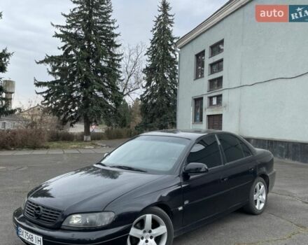 Черный Опель Омега, объемом двигателя 2.5 л и пробегом 390 тыс. км за 3400 $, фото 1 на Automoto.ua