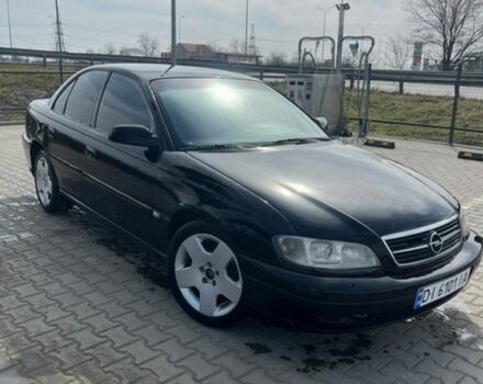 Черный Опель Омега, объемом двигателя 2.6 л и пробегом 300 тыс. км за 2500 $, фото 1 на Automoto.ua