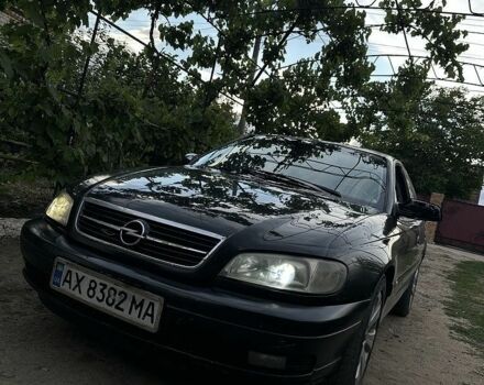 Черный Опель Омега, объемом двигателя 2.2 л и пробегом 300 тыс. км за 2600 $, фото 1 на Automoto.ua