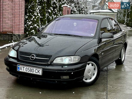 Черный Опель Омега, объемом двигателя 2.2 л и пробегом 290 тыс. км за 2350 $, фото 1 на Automoto.ua