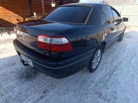 Чорний Опель Омега, об'ємом двигуна 2.6 л та пробігом 298 тис. км за 2750 $, фото 1 на Automoto.ua