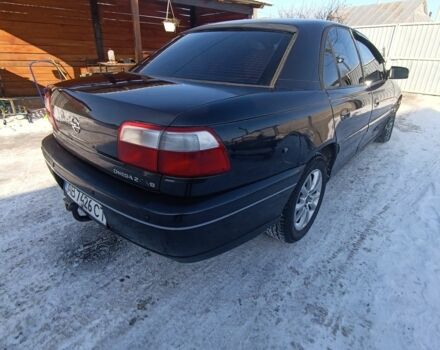 Чорний Опель Омега, об'ємом двигуна 2.6 л та пробігом 298 тис. км за 2750 $, фото 1 на Automoto.ua