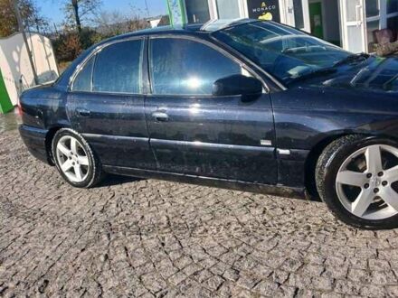 Черный Опель Омега, объемом двигателя 2.5 л и пробегом 215 тыс. км за 3000 $, фото 1 на Automoto.ua