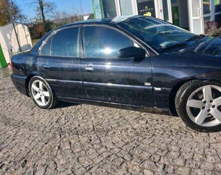 Черный Опель Омега, объемом двигателя 2.5 л и пробегом 215 тыс. км за 3000 $, фото 1 на Automoto.ua