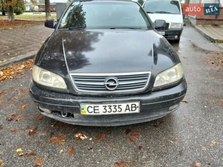 Черный Опель Омега, объемом двигателя 2.2 л и пробегом 220 тыс. км за 2500 $, фото 1 на Automoto.ua