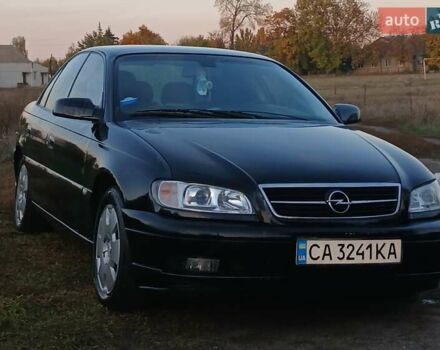 Опель Омега 2003 в Черкассах на Automoto.ua Черный Опель Омега, объемом двигателя 2.17 л и пробегом 273 тыс. км за 4200 $, фото 1 на Automoto.ua