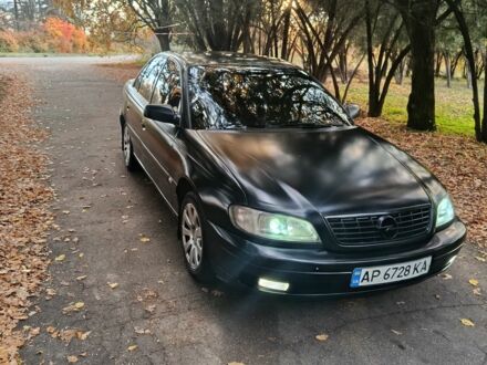 Черный Опель Омега, объемом двигателя 2.6 л и пробегом 350 тыс. км за 3700 $, фото 1 на Automoto.ua