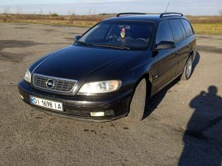 Черный Опель Омега, объемом двигателя 2.5 л и пробегом 334 тыс. км за 4200 $, фото 1 на Automoto.ua