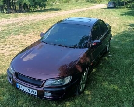 Фиолетовый Опель Омега, объемом двигателя 2.5 л и пробегом 250 тыс. км за 4200 $, фото 15 на Automoto.ua