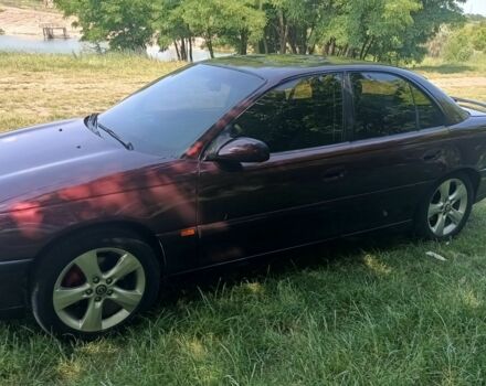 Фиолетовый Опель Омега, объемом двигателя 2.5 л и пробегом 250 тыс. км за 4200 $, фото 3 на Automoto.ua