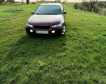 Фиолетовый Опель Омега, объемом двигателя 2.5 л и пробегом 250 тыс. км за 4200 $, фото 14 на Automoto.ua