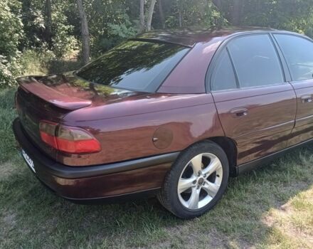 Фиолетовый Опель Омега, объемом двигателя 2.5 л и пробегом 250 тыс. км за 4200 $, фото 6 на Automoto.ua