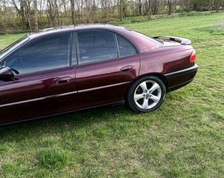 Фиолетовый Опель Омега, объемом двигателя 2.5 л и пробегом 250 тыс. км за 4200 $, фото 13 на Automoto.ua