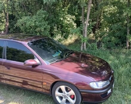 Фиолетовый Опель Омега, объемом двигателя 2.5 л и пробегом 250 тыс. км за 4200 $, фото 12 на Automoto.ua