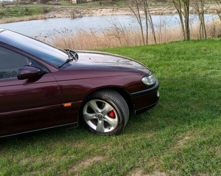 Фиолетовый Опель Омега, объемом двигателя 2.5 л и пробегом 250 тыс. км за 4200 $, фото 5 на Automoto.ua