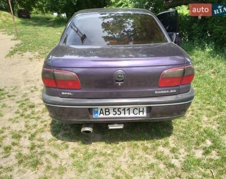 Фіолетовий Опель Омега, об'ємом двигуна 2 л та пробігом 303 тис. км за 3000 $, фото 3 на Automoto.ua