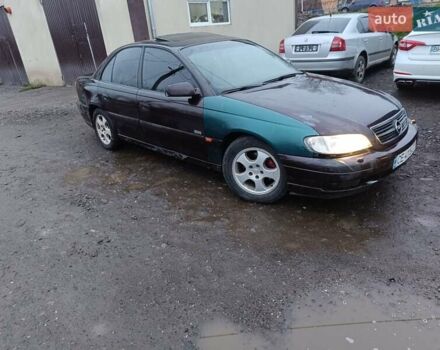 Фіолетовий Опель Омега, об'ємом двигуна 2.2 л та пробігом 256 тис. км за 1650 $, фото 9 на Automoto.ua